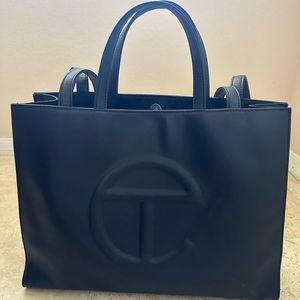 Medium size black telfar purse